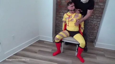 Superhero Captured: Kneeling Oral Sex on Brick Wall with Red Heels