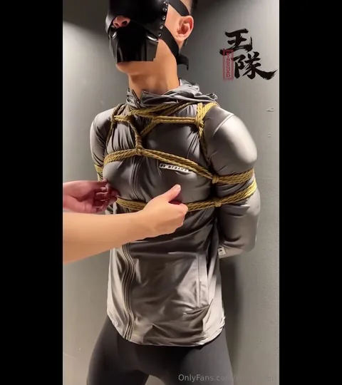 Blindfolded & Bound in Black Leather Harness – Gold Rope Restraint