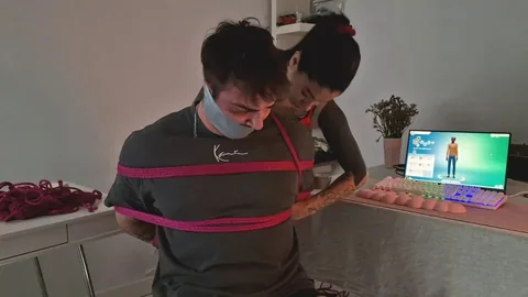 Speakus Bondage Punishes Speakuss in Red Corset BDSM Gaming Orgy
