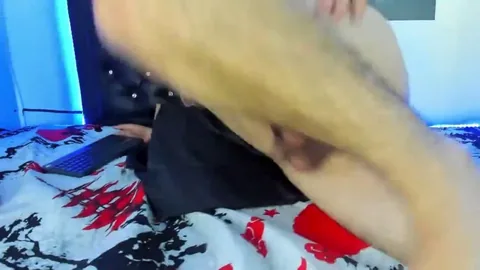 Andrewhorny in Red Thong Masturbating on Bed with Blue Walls